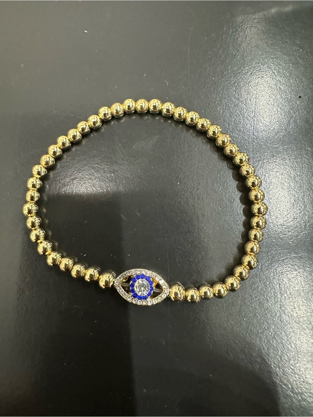 BaubleBar Gold Tone Beaded Bracelet with Blue Evil Eye Charm NWT